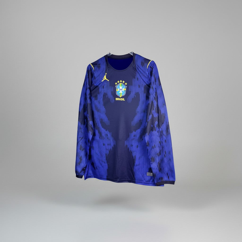 Deep navy long sleeve football jersey with electric blue pinstripe graphic pattern and dark geometric shadow panels