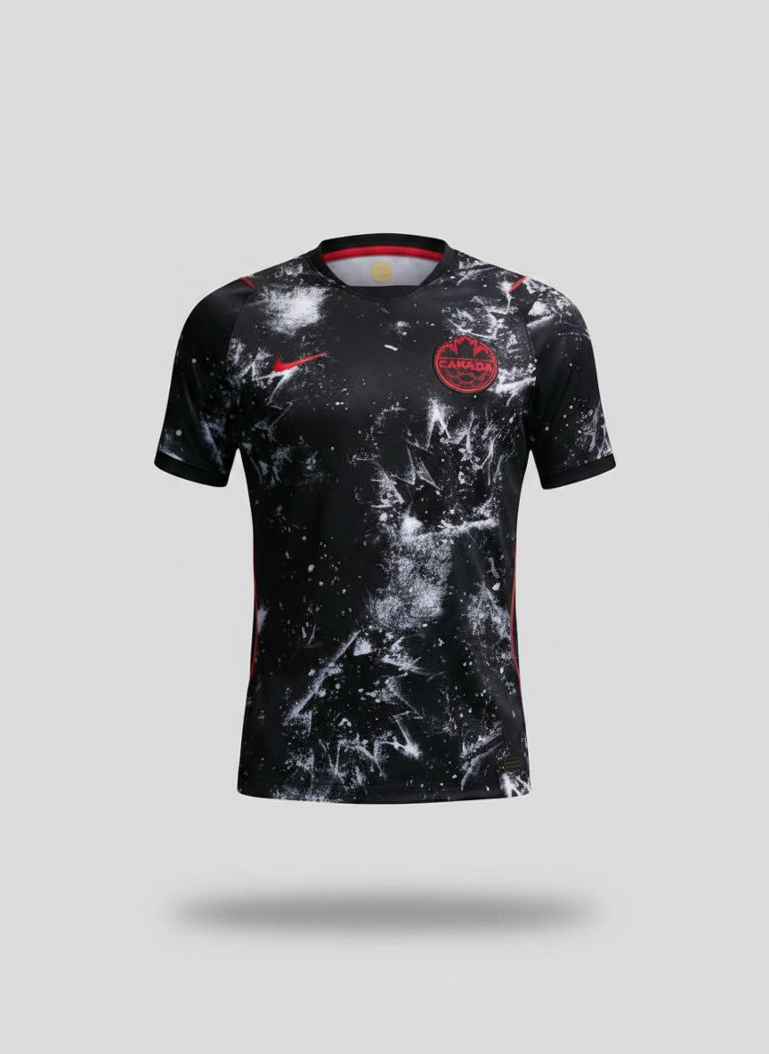 Black football jersey with white paint splatter galaxy graphic print, red crew neck trim and circular red crest