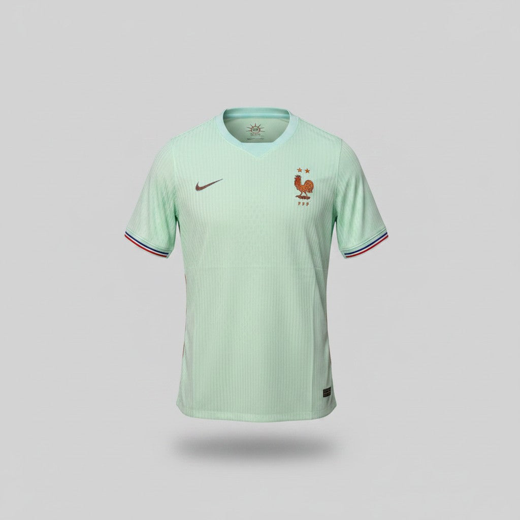 Mint green France FFF football jersey with Nike swoosh, Gallic rooster crest and tricolor sleeve trim