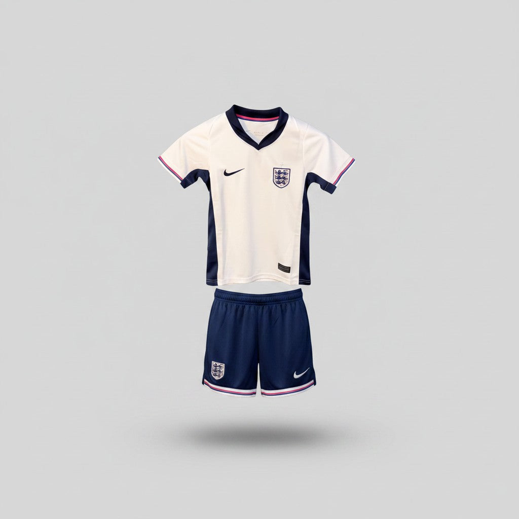 White football jersey with navy V-neck collar and pink trim paired with navy blue shorts