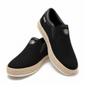 Black canvas slip-on sneakers with beige woven soles
