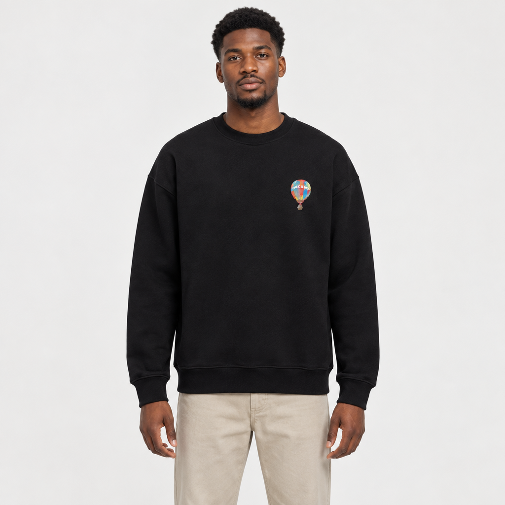 Black sweatshirt on a Black adult model