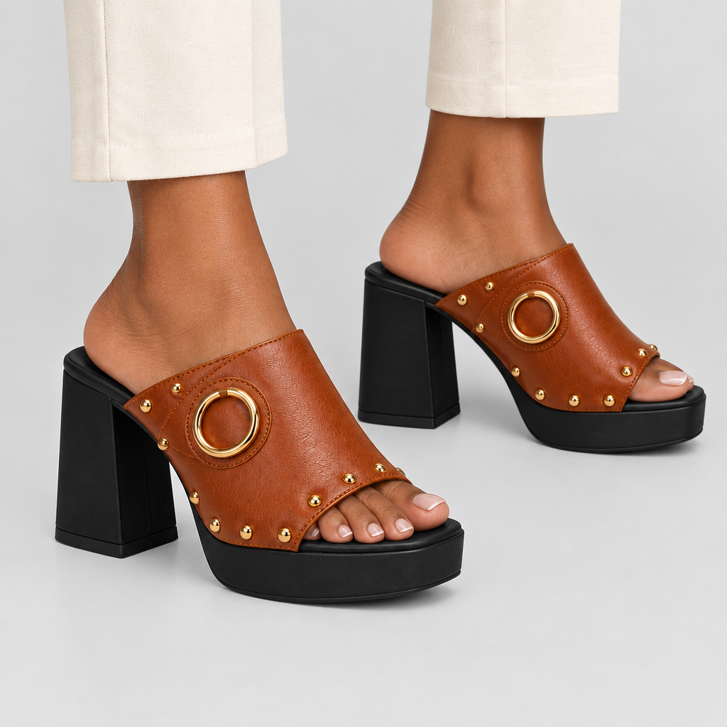 Brown platform sandals worn by a model