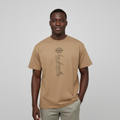 Corrected model shot of the tan graphic tee