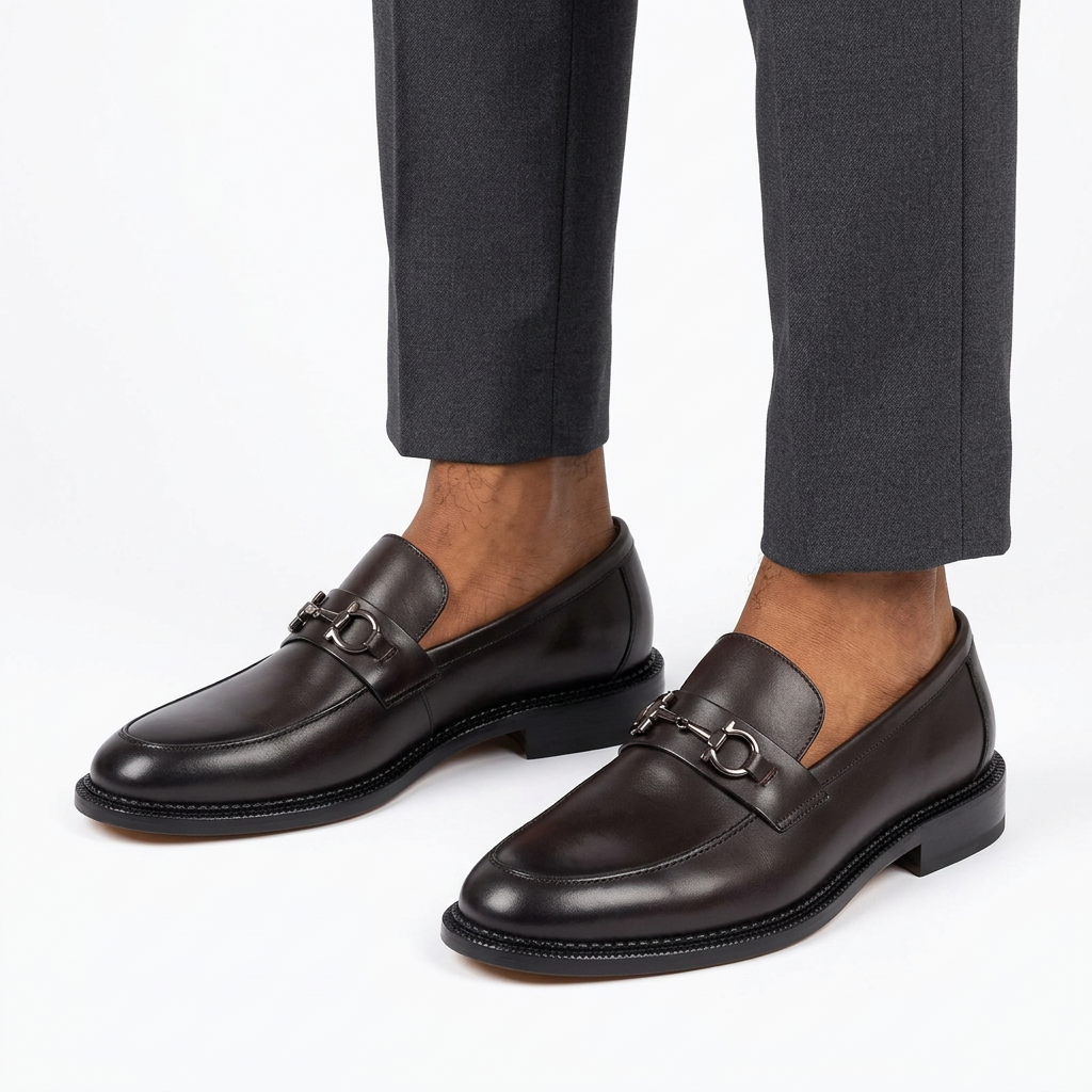 Dark brown loafers on model