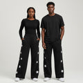 Black All-Over Star Print Wide-Leg Jogger Trousers