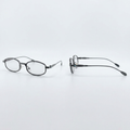 Silver-tone rounded rectangular clear-lens eyeglasses with decorative temple details, front and side views