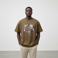 Model wearing the olive metallic crest graphic t-shirt