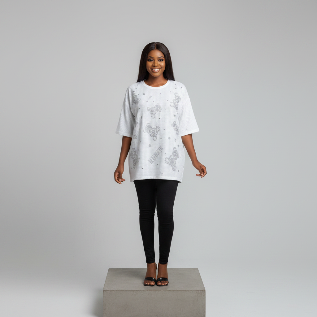 Nigerian female model front view - white rhinestone Mickey motif top