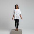 Nigerian female model front view - white rhinestone Mickey motif top