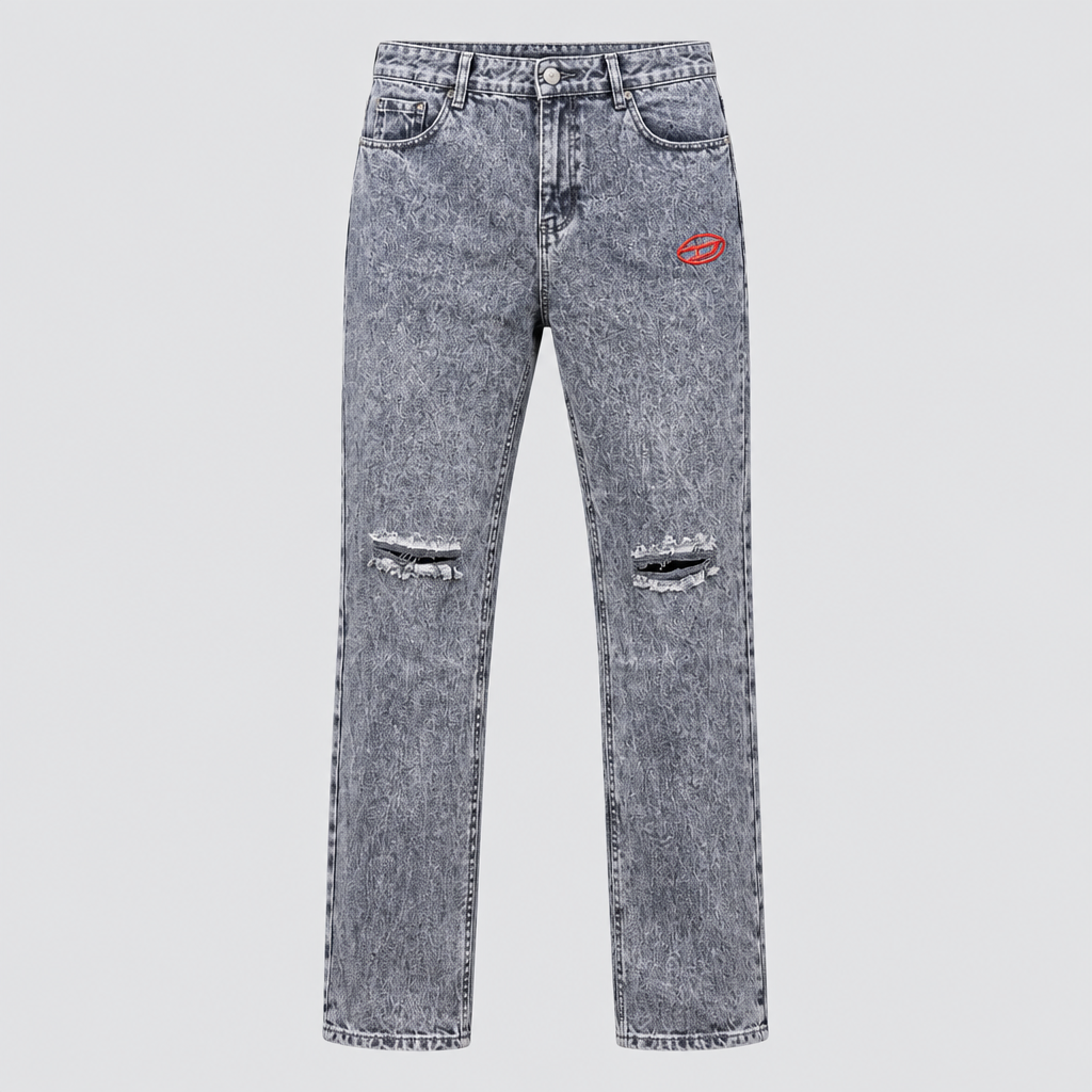 Light grey acid-wash jeans with a red lip patch and distressed knees