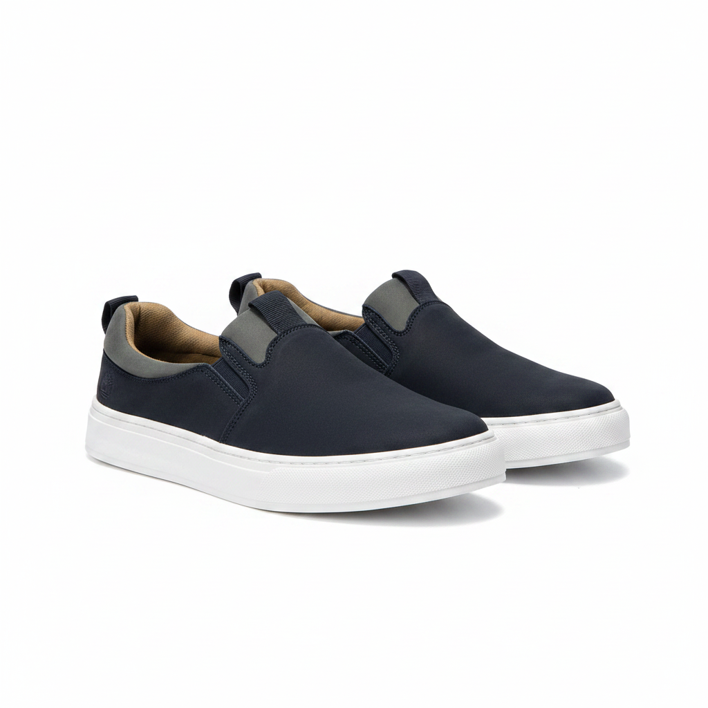 Men's navy blue nubuck leather slip-on sneakers with white sole pair product shot
