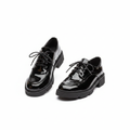 Women's black patent leather lace-up Oxford shoe — ghost mannequin view