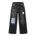 Charcoal wide-leg patchwork denim jeans shown in ghost mannequin style