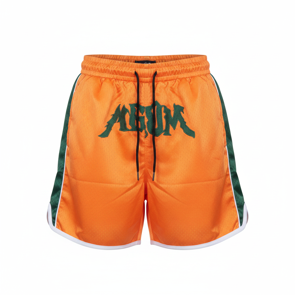 Orange satin athletic shorts on ghost mannequin, white background