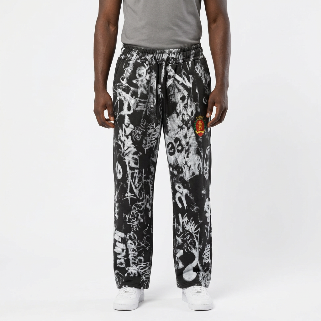 Adult Black model wearing black and grey graffiti-print joggers