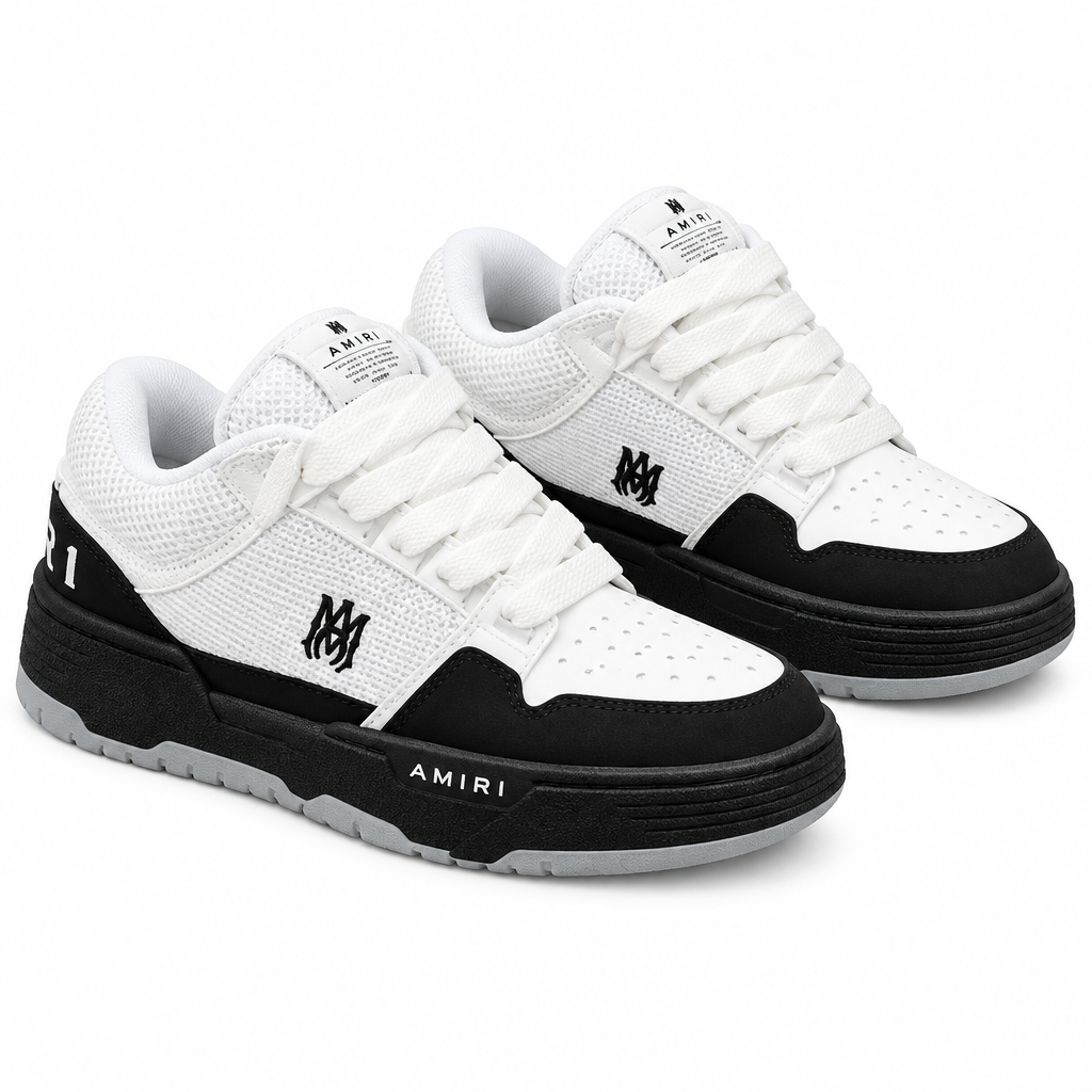 Pair of black and white textured-panel low-top sneakers on white