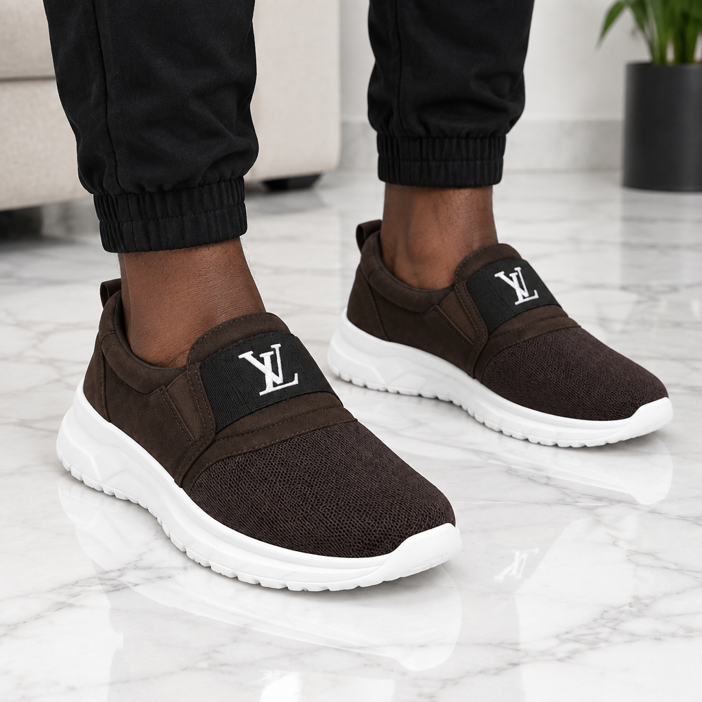 Man wearing brown mesh monogram strap slip-on sneakers