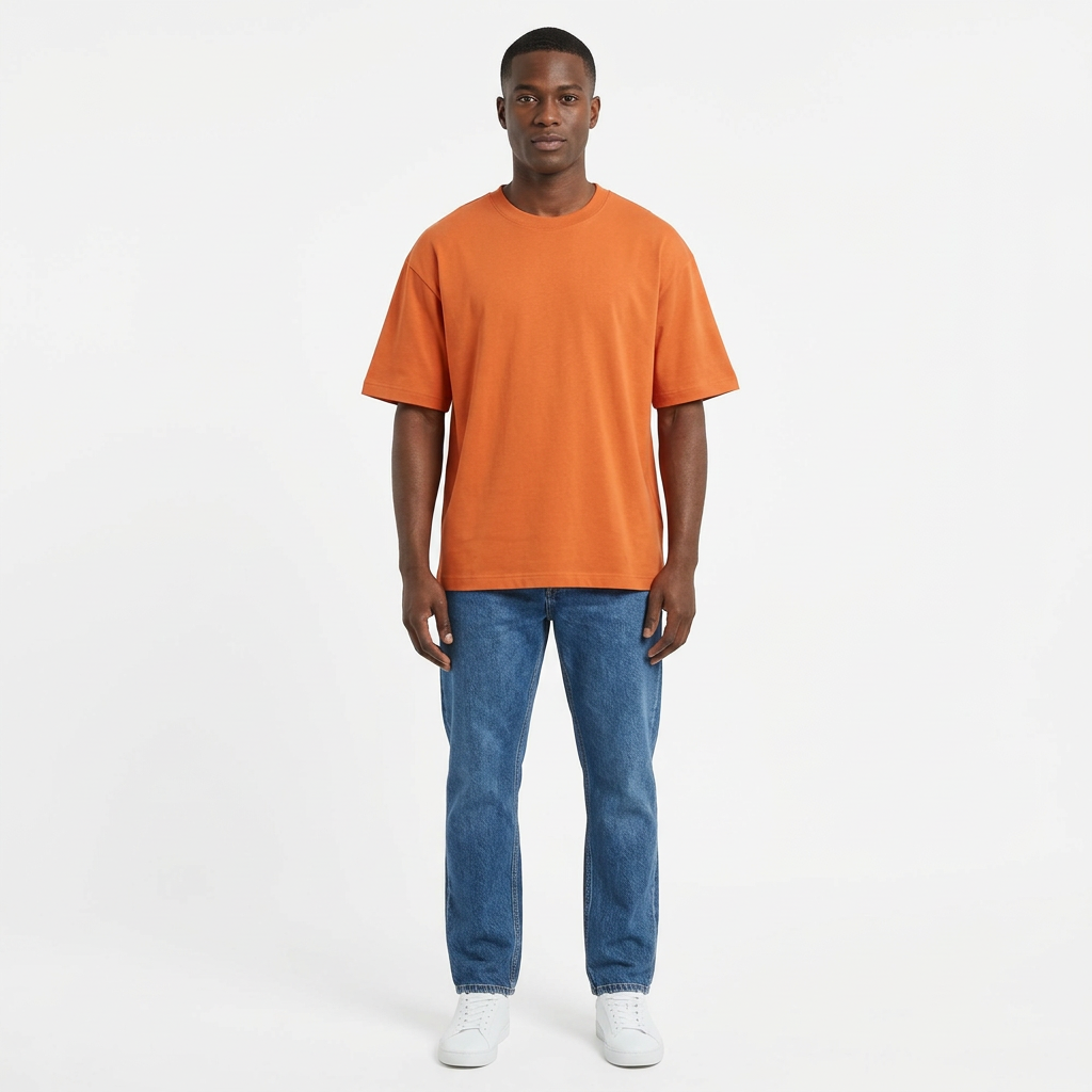 Full-body Black adult model wearing a plain orange T-shirt