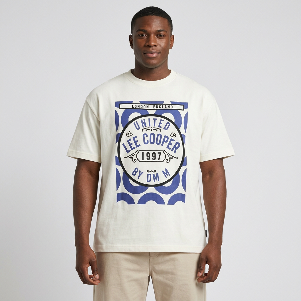 Nigerian man wearing white blue-badge graphic T-shirt