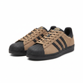 Men's tan brown suede shell-toe sneakers with black stripes ghost mannequin front view