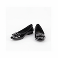 Women's black patent flat pumps with block buckle – ghost mannequin pair view
