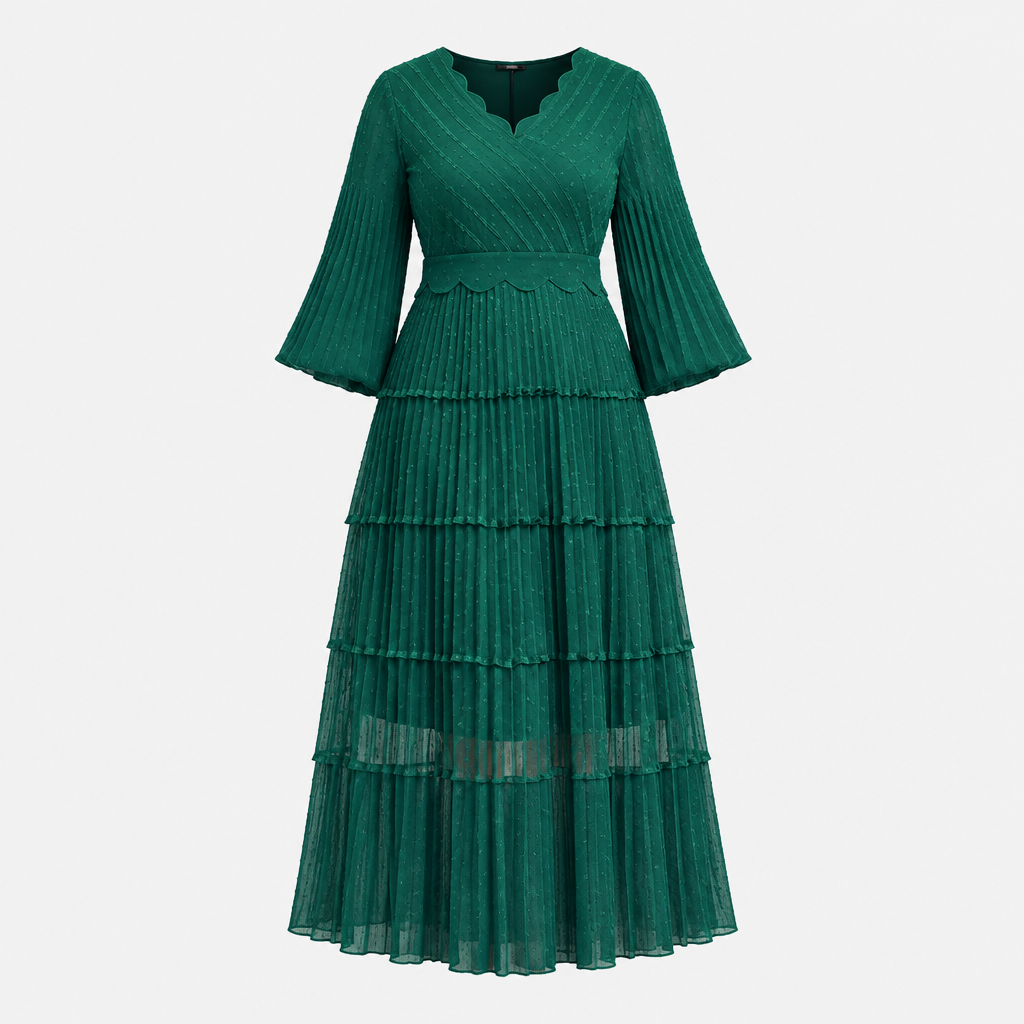 Ghost mannequin view of an emerald tiered pleated gown with bell sleeves