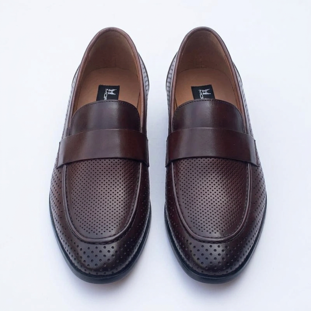 Straight-on dark brown perforated loafers with plain front straps
