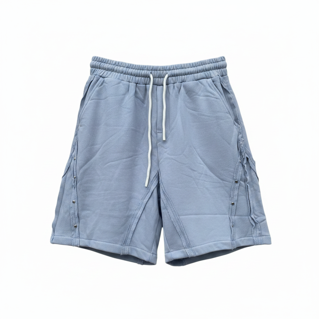 Men's slate grey snap-button panel distressed sweat shorts — ghost mannequin front view