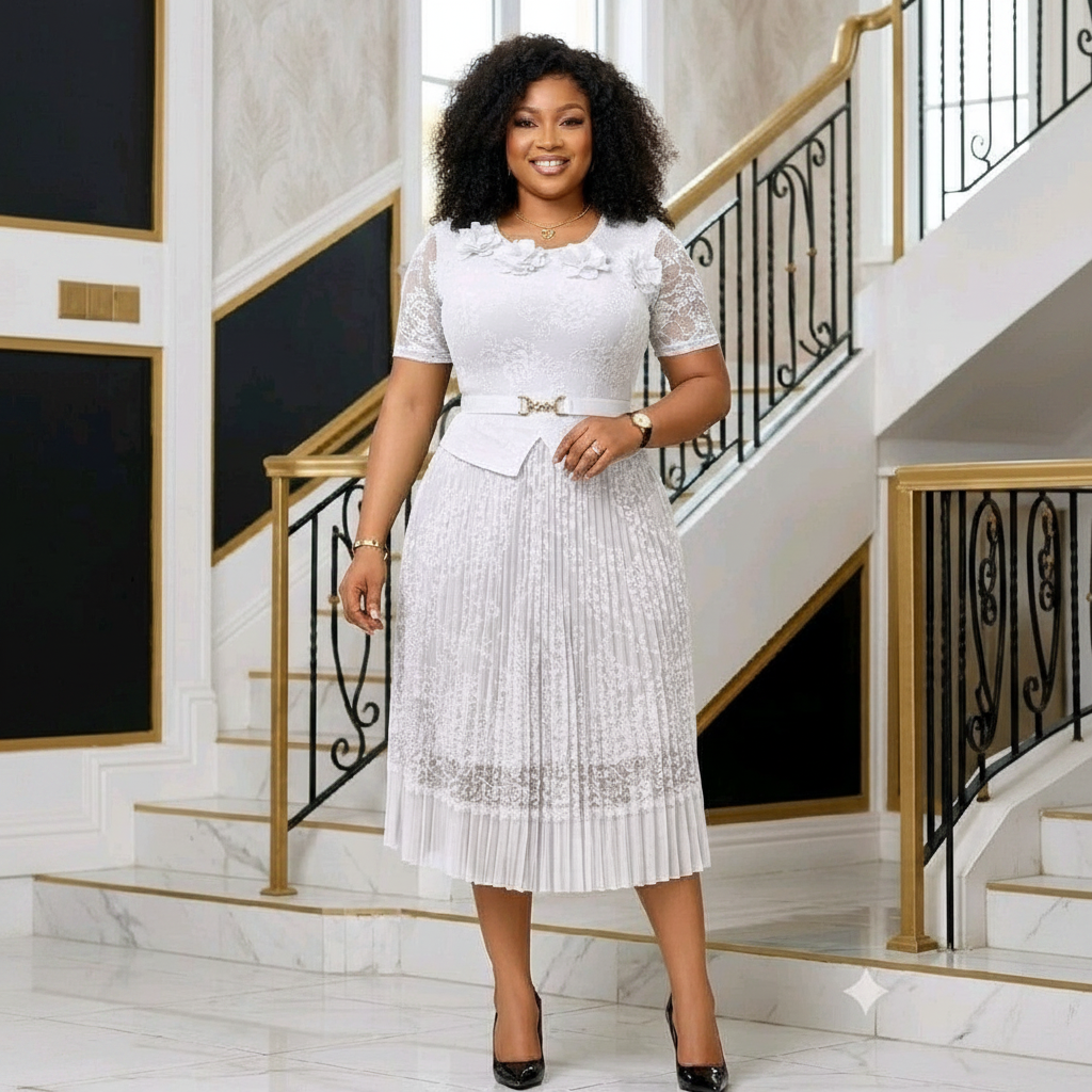 Nigerian woman wearing white lace floral peplum top and pleated midi skirt set