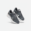 Ash grey mesh sneakers with white sole, centred on a plain off-white background