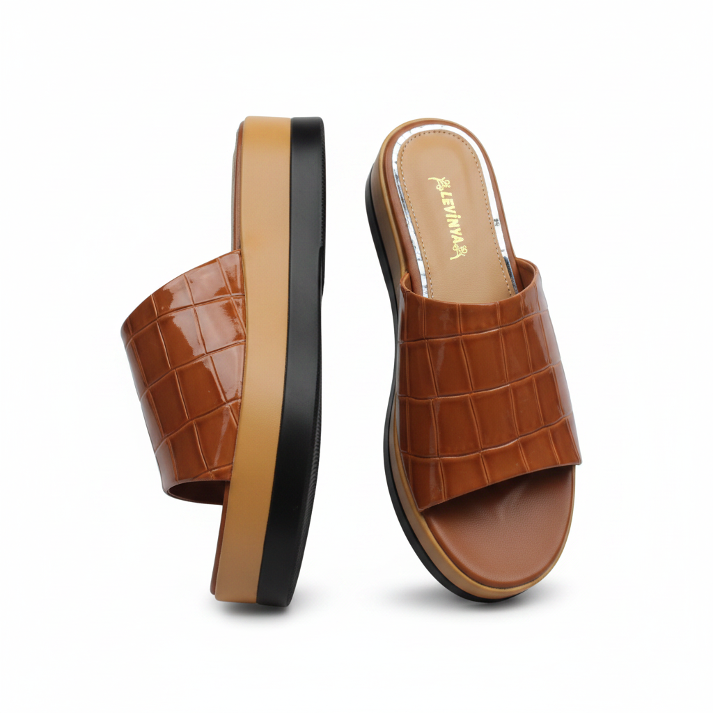 Tan patent croc-embossed platform slide mule pair ghost mannequin product shot showing thick tan platform sole, plain white background