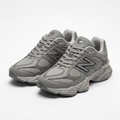 Pair of tonal grey mesh-panel chunky sneakers on a white catalogue background