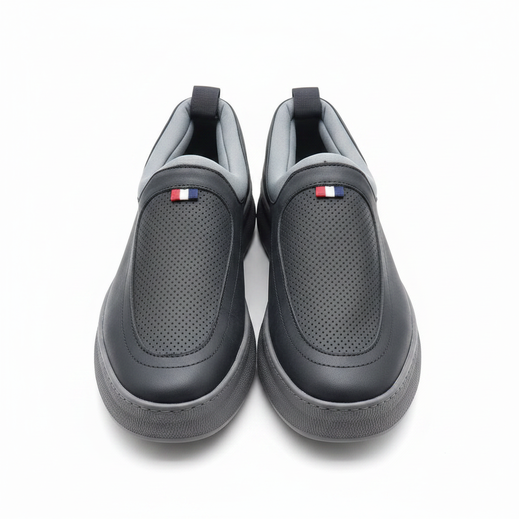 Men's dark navy perforated leather slip-on platform sneakers with grey collar pair product shot