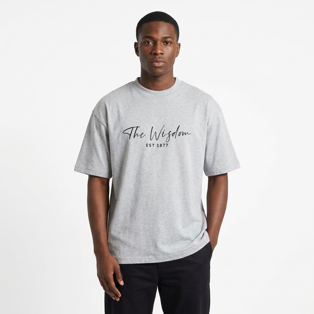 Nigerian male model wearing the grey script-graphic crew-neck tee against white