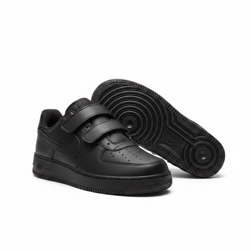 Steezu all-black velcro low-top sneaker ghost mannequin product shot, plain white background