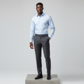 Nigerian male model wearing light blue long-sleeved shirt, front view