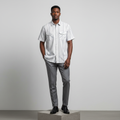 Nigerian male model wearing white grey striped short-sleeved shirt