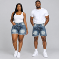 Black Nigerian woman and man wearing dark-blue script-detail denim shorts together