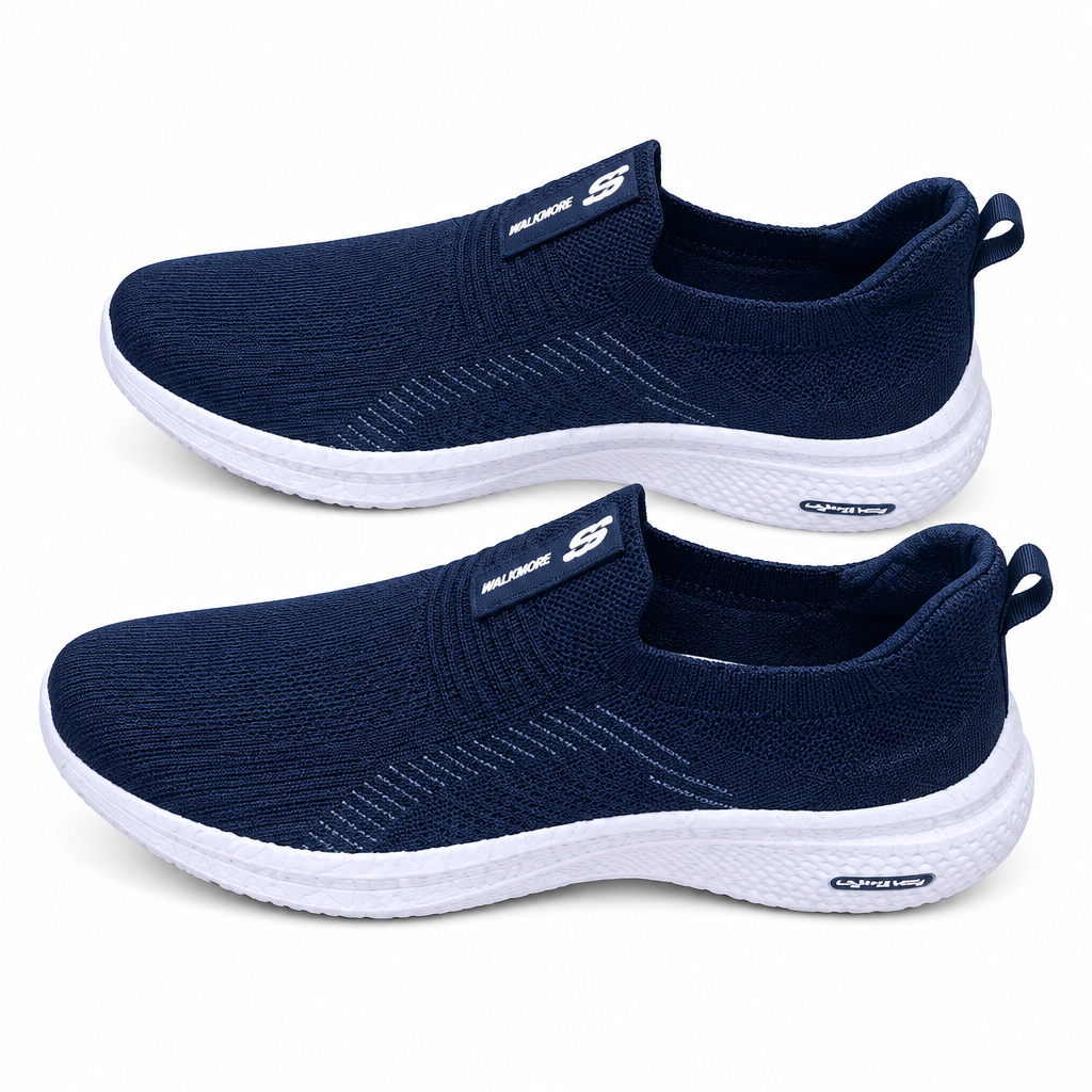 Pair of navy stitched-panel slip-on sneakers on white