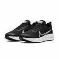 Nike ZoomX black and white running sneaker ghost mannequin product shot