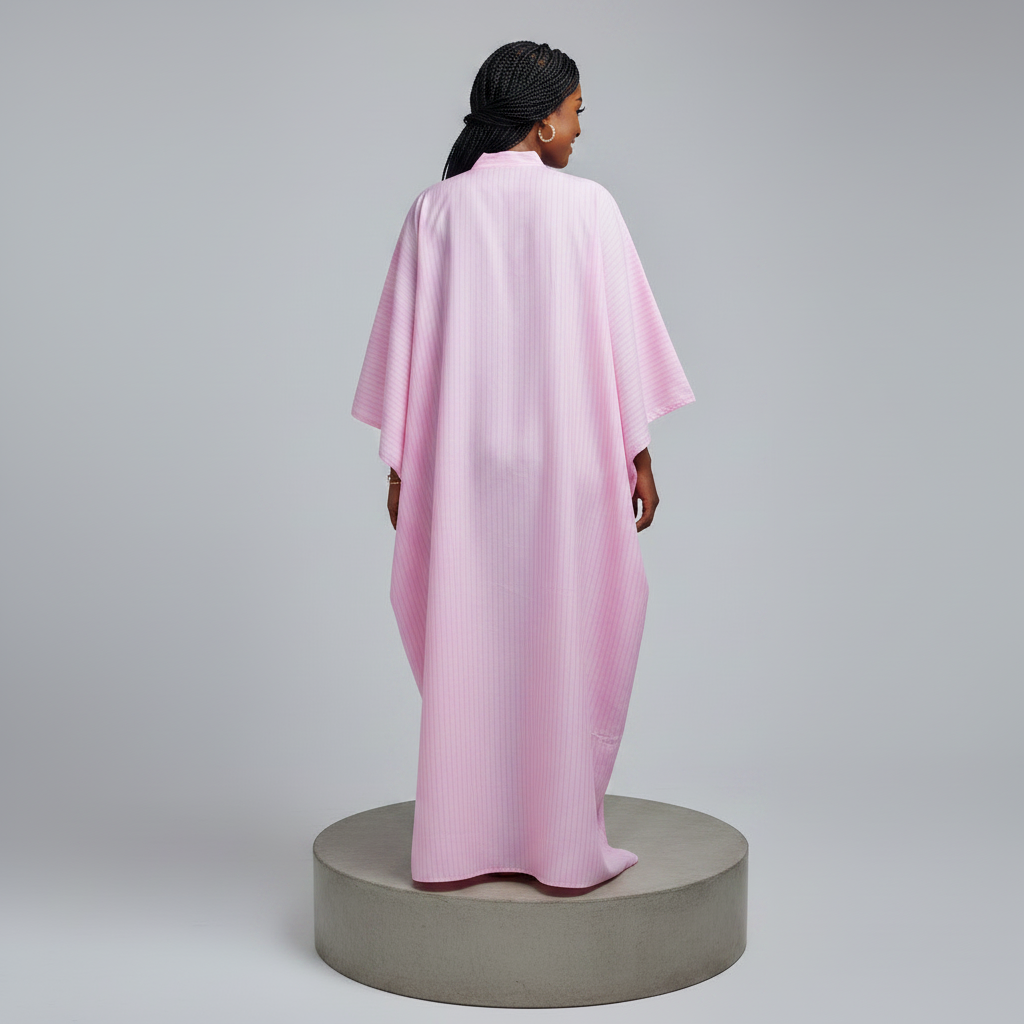 Nigerian female model back view - pink balloon bouquet graphic kaftan dress