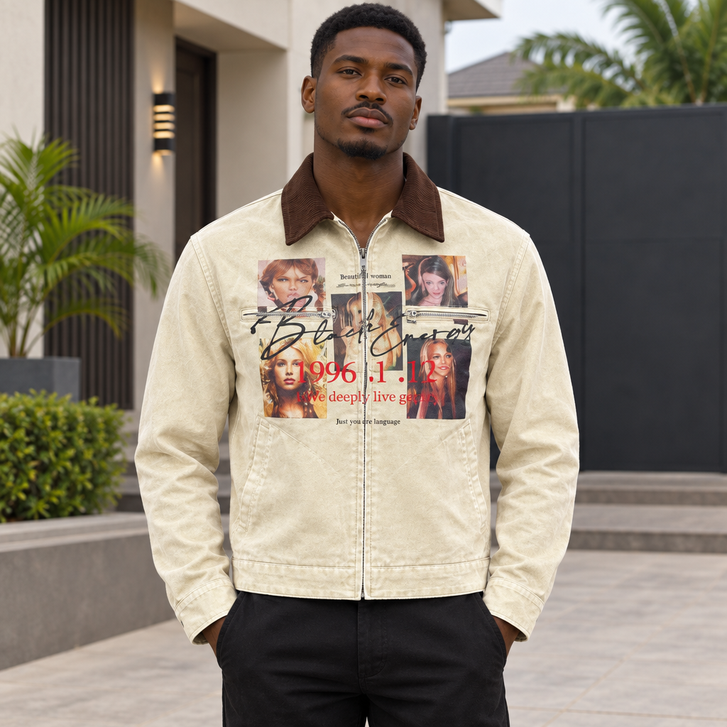 Black Nigerian adult model wearing a cream graphic denim jacket