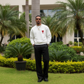 Men's White Red Heart Logo Round Neck Sweatshirt – Nigerian Male Model Shot