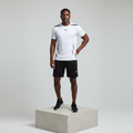 Nigerian male model wearing white and black sports jersey set