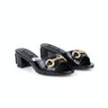 Ghost mannequin pair view of black patent leather horsebit chain block heel mules
