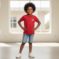 Nigerian boy model wearing Boys Graphic Polo Shirt