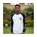 Nigerian male model wearing men's white black raglan gothic print long sleeve shirt