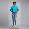 Nigerian female model front view wearing teal rhinestone fashion text T-shirt