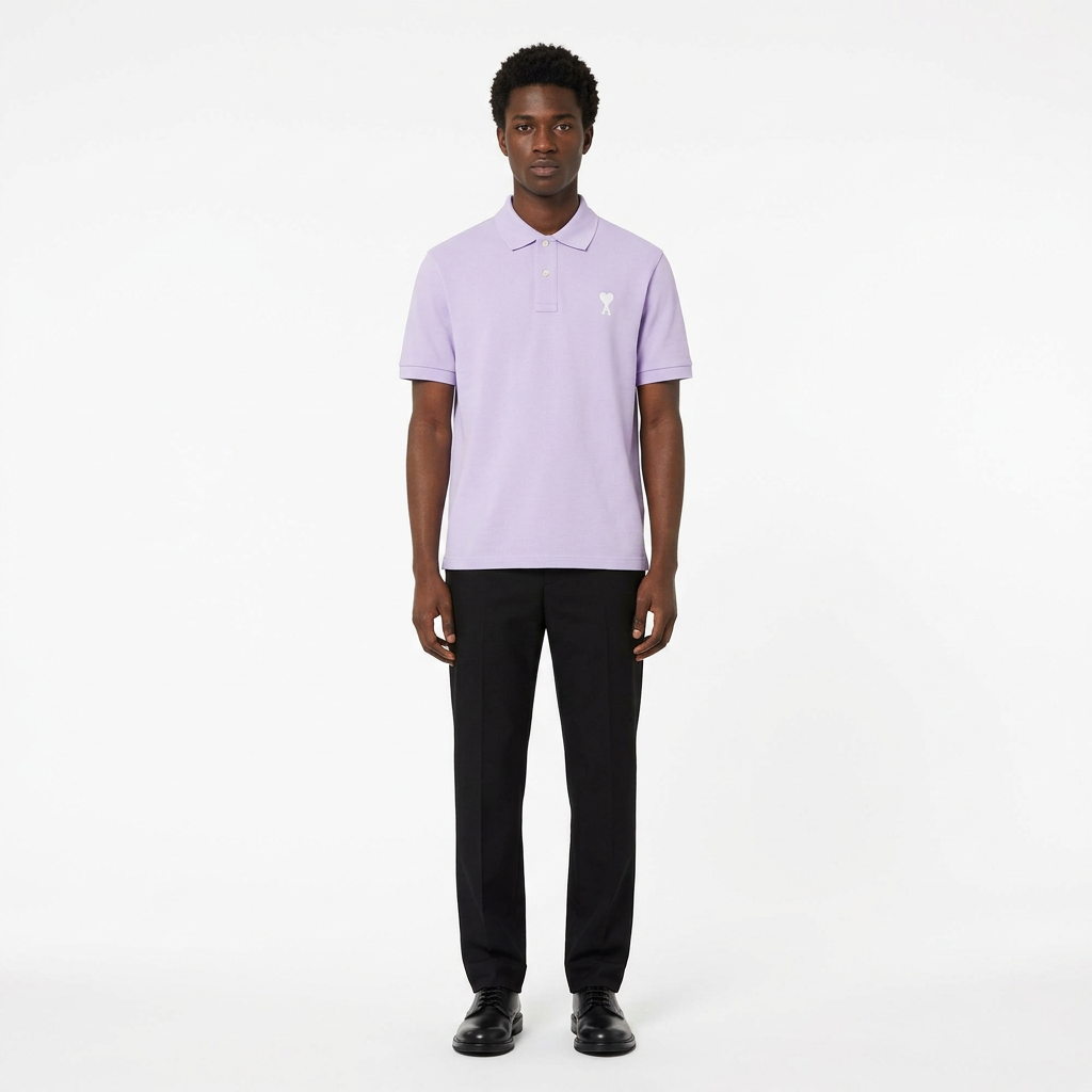 Full-body adult Black man wearing a lilac white heart-detail polo